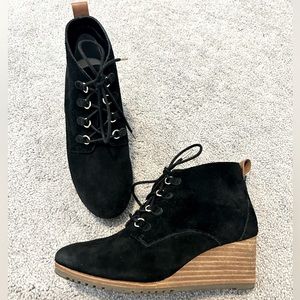 Size 6.5 black suede wedge bootie.